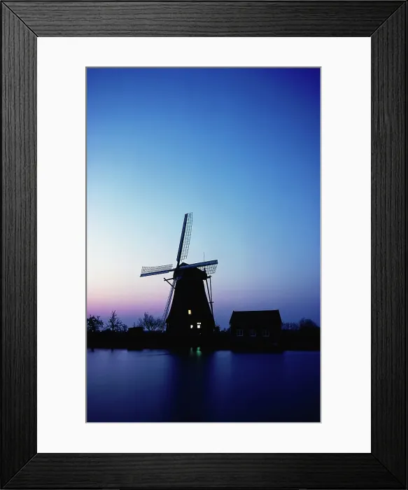 Framed Print : Silhouette of a traditional windmill at sunset