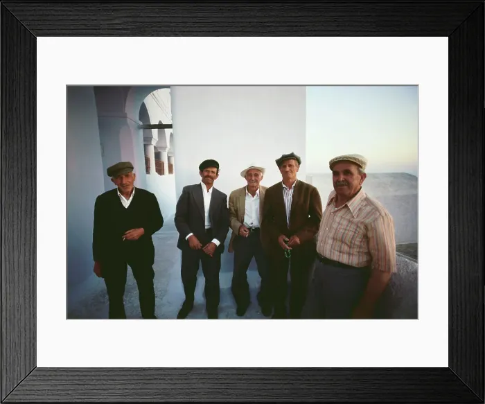 Framed Print : Group of local senior men standing together
