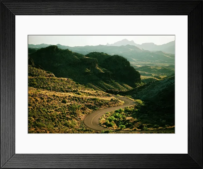 Framed Print : Winding road passing through mountains Framed Print : Winding road passing through mountains