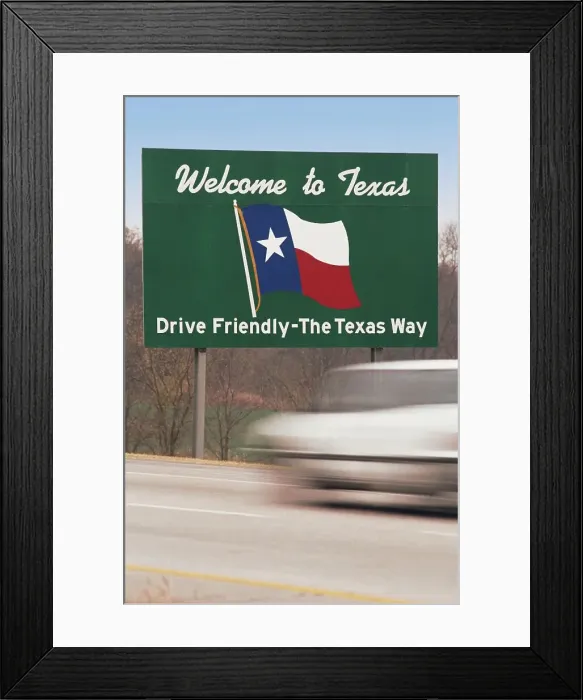 Framed Print : Car driving past Welcome to Texas sign at national border Framed Print : Car driving past Welcome to Texas sign at national border