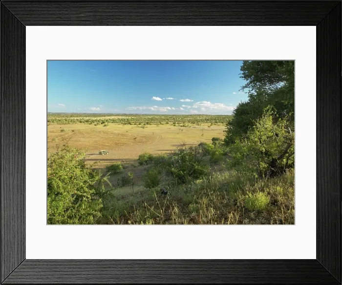 Framed Print : Land Rover in bushveld scene. Mashatu Game Reserve