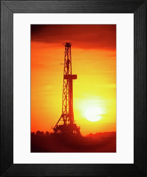 Framed Print : Silhouette of an oil drilling rig at sunset Framed Print : Silhouette of an oil drilling rig at sunset
