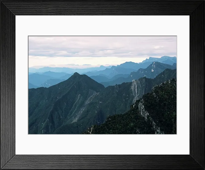Framed Print : Clouds over a mountainous landscape Framed Print : Clouds over a mountainous landscape