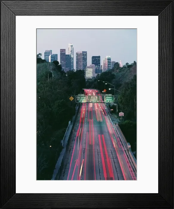 Framed Print : Traffic moving on a freeway at dusk Framed Print : Traffic moving on a freeway at dusk
