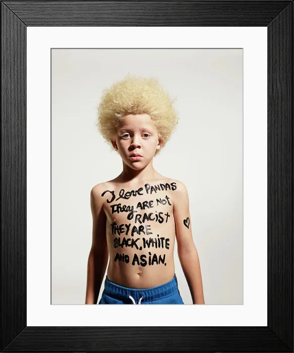 Framed Print : Portrait of Albino boy with words painted on body I love pandas, They are not racist, they are black, white and Asian