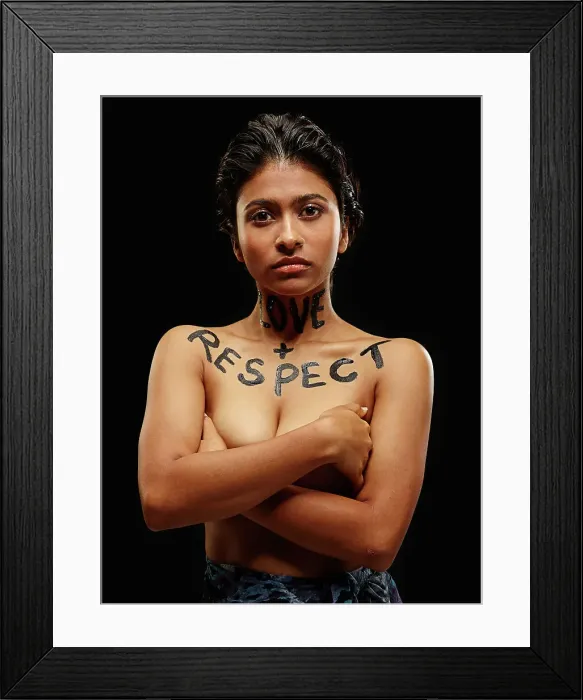 Framed Print : Portrait of Indian woman with arms crossed and words painted across neck and chest Love + Respect Framed Print : Portrait of Indian woman with arms crossed and words painted across neck and chest Love + Respect