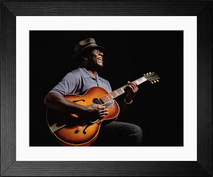 Framed Print : BLD025915. African American man playing guitar Framed Print : BLD025915. African American man playing guitar
