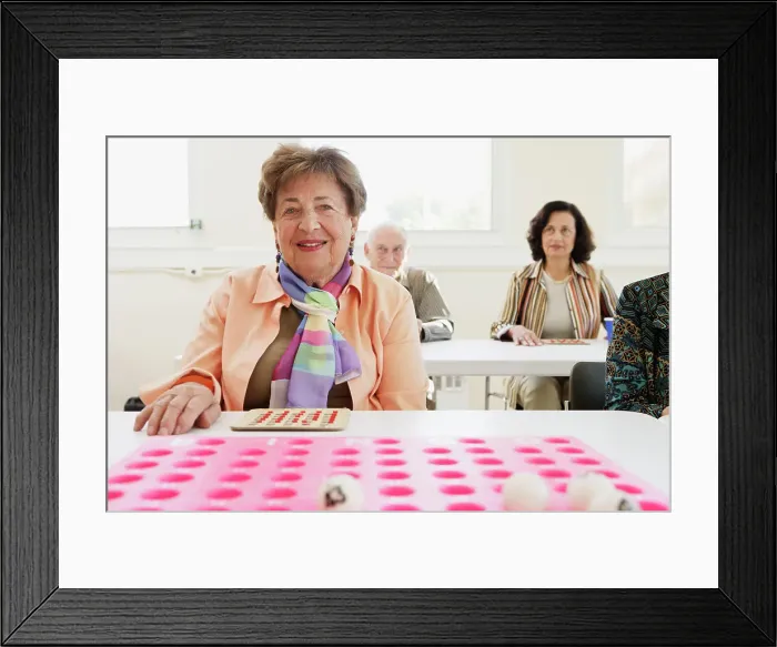 Framed Print : BLD016376. Elderly woman playing bingo Framed Print : BLD016376. Elderly woman playing bingo