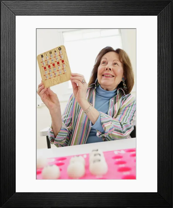 Framed Print : BLD016379. Elderly woman winning at bingo Framed Print : BLD016379. Elderly woman winning at bingo