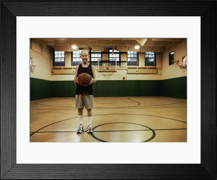 Framed Print : BLD016431. Elderly man standing in basketball court Framed Print : BLD016431. Elderly man standing in basketball court
