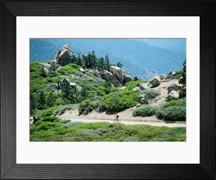 Framed Print : High angle view of a person cycling on a mountain Framed Print : High angle view of a person cycling on a mountain