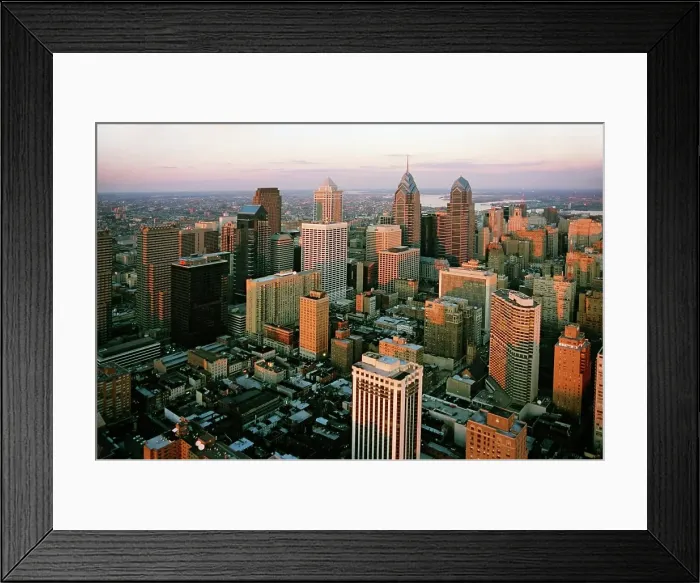 Framed Print : Aerial view of a cityscape with a river in the background