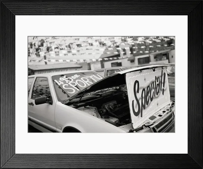 Framed Print : Hood of car open to display Special! at car dealership Framed Print : Hood of car open to display Special! at car dealership