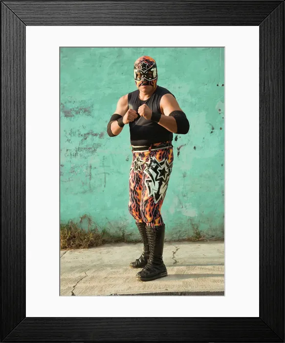 Framed Print : BLD069806. Hispanic man wearing Mexican wrestling costume