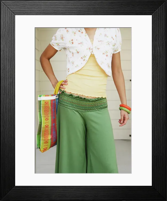 Framed Print : BLD021836. Woman holding bag