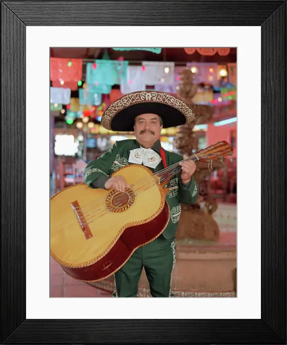 Framed Print : BLD046848. Hispanic mariachi musician playing guitar Framed Print : BLD046848. Hispanic mariachi musician playing guitar