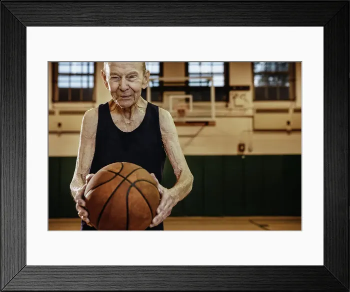 Framed Print : BLD016436. Elderly man playing basketball Framed Print : BLD016436. Elderly man playing basketball