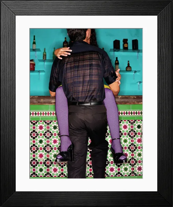 Framed Print : BLD067804. Couple kissing in bar Framed Print : BLD067804. Couple kissing in bar