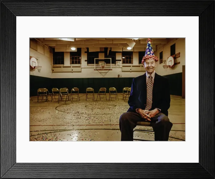 Framed Print : BLD016443. Elderly man wearing a party hat Framed Print : BLD016443. Elderly man wearing a party hat