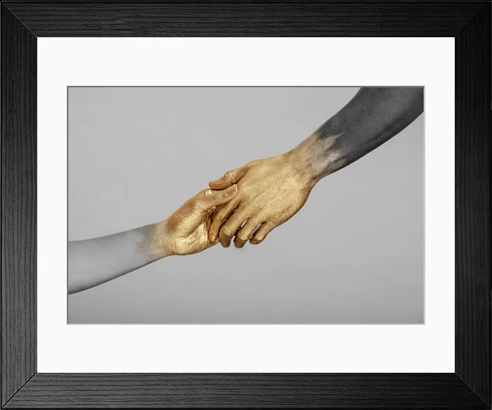 Framed Print : Yes. Desaturated shot of mixed-race woman and Black man with gold painted Framed Print : Yes. Desaturated shot of mixed-race woman and Black man with gold painted