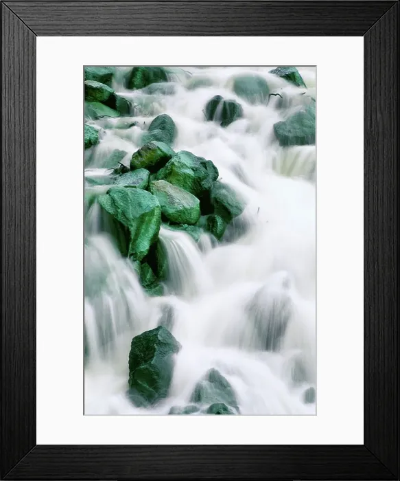 Framed Print : Water rushing over green rocks Framed Print : Water rushing over green rocks