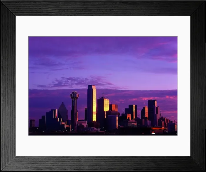 Framed Print : Downtown city skyline against a purple sky at sunset Framed Print : Downtown city skyline against a purple sky at sunset