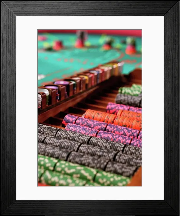 Framed Print : Casino chips on craps table in a casino Framed Print : Casino chips on craps table in a casino
