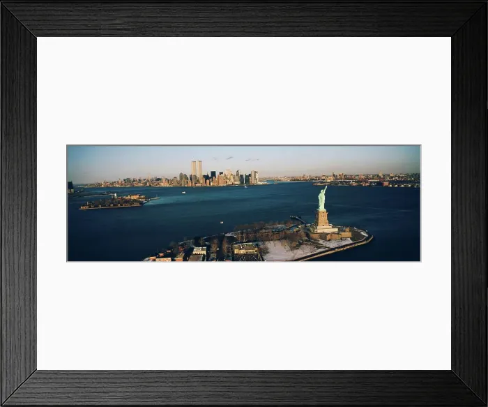 Framed Print : High angle view of Ellis Island with the Statue of Liberty and the World Trade Center in Manhattan Framed Print : High angle view of Ellis Island with the Statue of Liberty and the World Trade Center in Manhattan