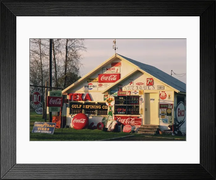 Framed Print : Antique store covered with vintage signs