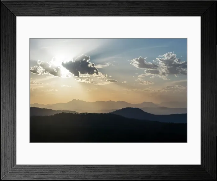Framed Print : Sunset over layers of hills