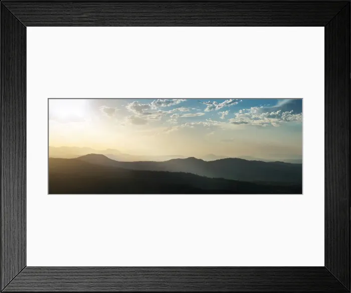 Framed Print : Sunlight over hills