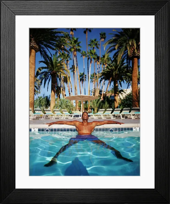 Framed Print : BLD001701. Man relaxing in swimming pool Framed Print : BLD001701. Man relaxing in swimming pool