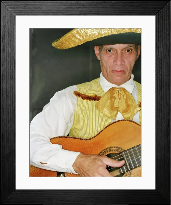 Framed Print : BLD189244. Senior man in traditional clothing playing guitar Framed Print : BLD189244. Senior man in traditional clothing playing guitar