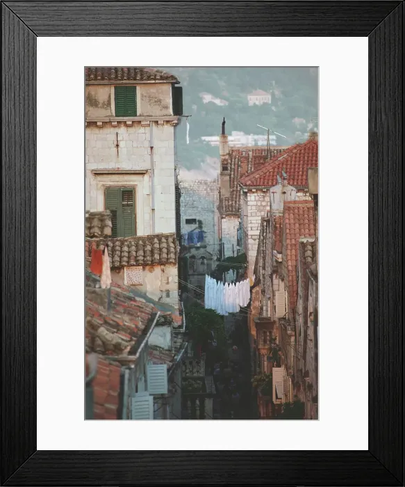Framed Print : Laundry hanging between buildings Framed Print : Laundry hanging between buildings