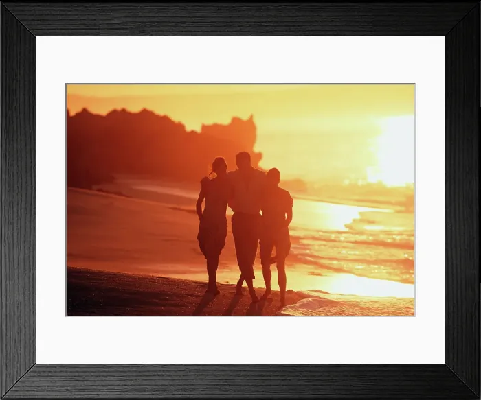 Framed Print : Three tourists walking on the beach Framed Print : Three tourists walking on the beach