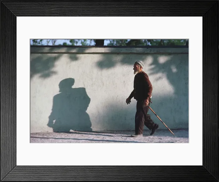 Framed Print : Senior man walking with cane, Turkey Framed Print : Senior man walking with cane, Turkey