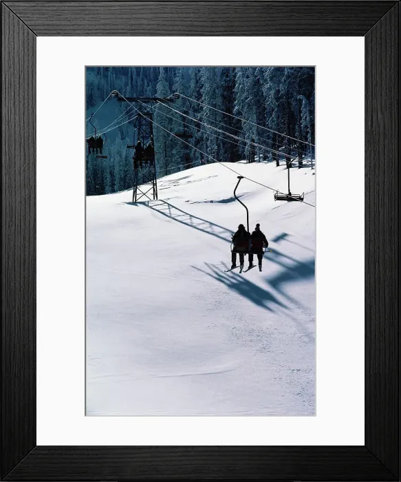 Framed Print : Silhouette of skiers in a ski lift Framed Print : Silhouette of skiers in a ski lift