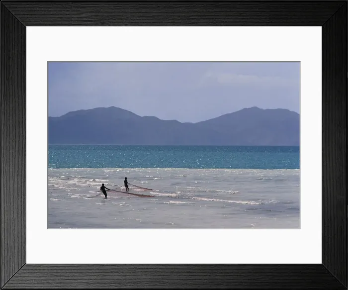 Framed Print : Men setting fishing nets in a lake Framed Print : Men setting fishing nets in a lake