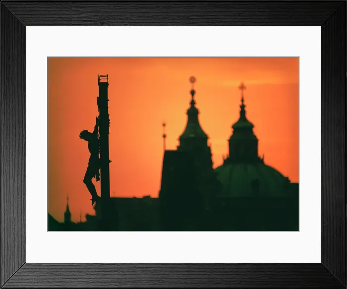 Framed Print : Silhouette of statue of Jesus Christ and a cathedral at sunset Framed Print : Silhouette of statue of Jesus Christ and a cathedral at sunset
