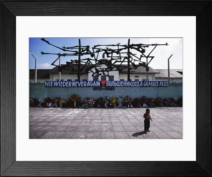 Framed Print : Child standing in front of a memorial Framed Print : Child standing in front of a memorial