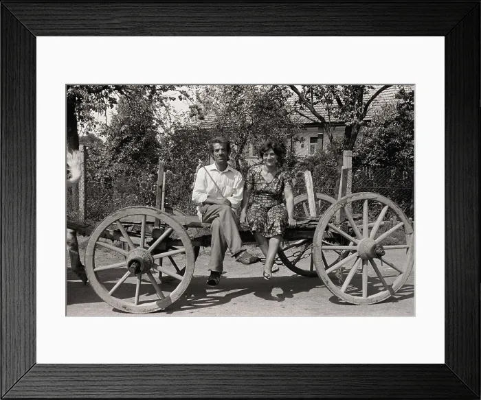 Framed Print : Couple sitting on a wagon, Gyor, Hungary Framed Print : Couple sitting on a wagon, Gyor, Hungary