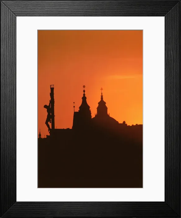 Framed Print : Silhouette of statue of Jesus Christ and a cathedral at sunset Framed Print : Silhouette of statue of Jesus Christ and a cathedral at sunset