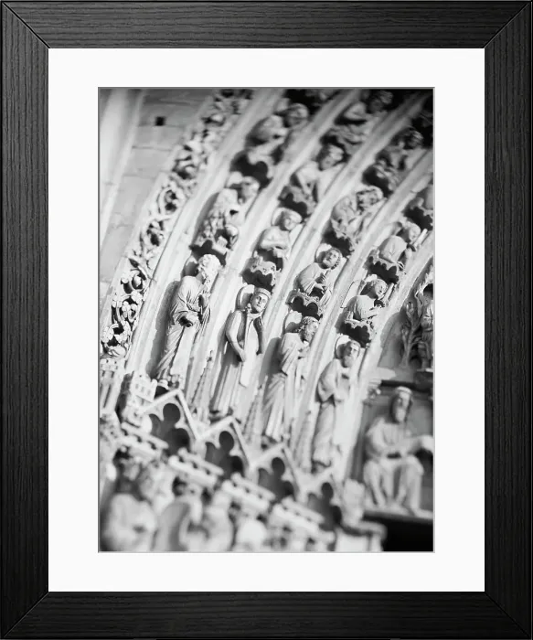 Framed Print : Detail of stone carvings of figures in a museum Framed Print : Detail of stone carvings of figures in a museum