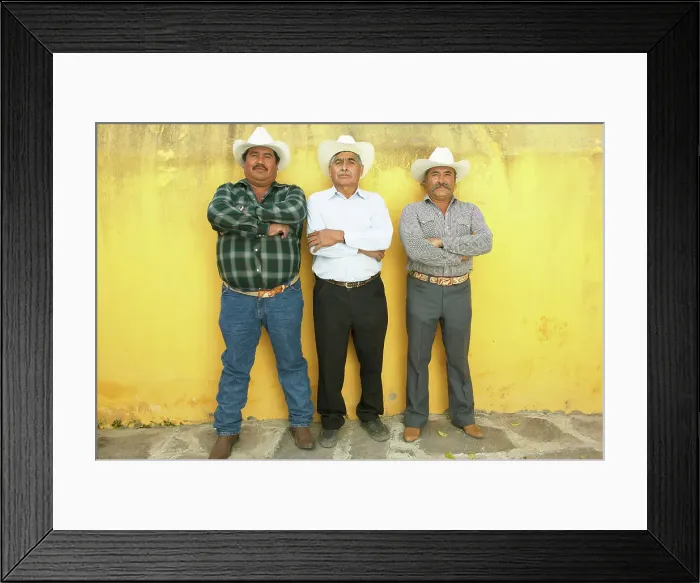 Framed Print : BLD195018. Three men standing with arms crossed