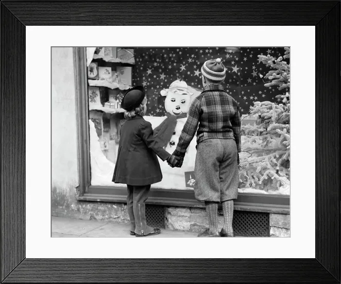 Framed Print : 1930S Boy And Girl Holding Hands Looking At Decorated Christmas Window