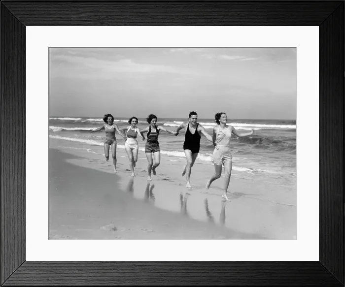 Framed Print : 1930S Four Women And One Man Running On Beach Holding Hands Framed Print : 1930S Four Women And One Man Running On Beach Holding Hands