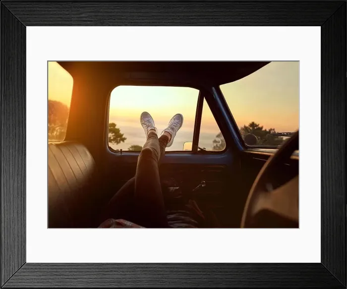 Framed Print : Roadtrip chill. Cropped shot of an unrecognizable woman lying in a car during a roadtrip