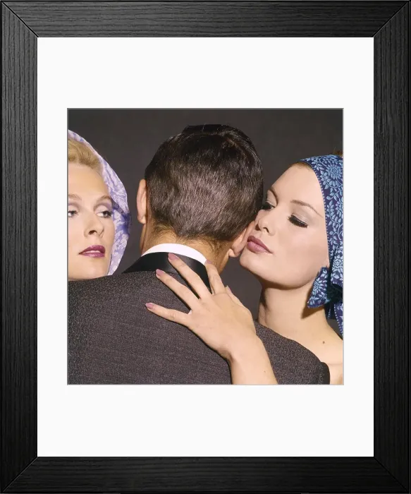 Framed Print : 1960s MAN BACK TO CAMERA 2 GLAMOROUS WOMEN WHISPERING INTO KISSING HIS EAR HAND AT HIS NECK CHEAT GIGOLO TRIANGLE Framed Print : 1960s MAN BACK TO CAMERA 2 GLAMOROUS WOMEN WHISPERING INTO KISSING HIS EAR HAND AT HIS NECK CHEAT GIGOLO TRIANGLE