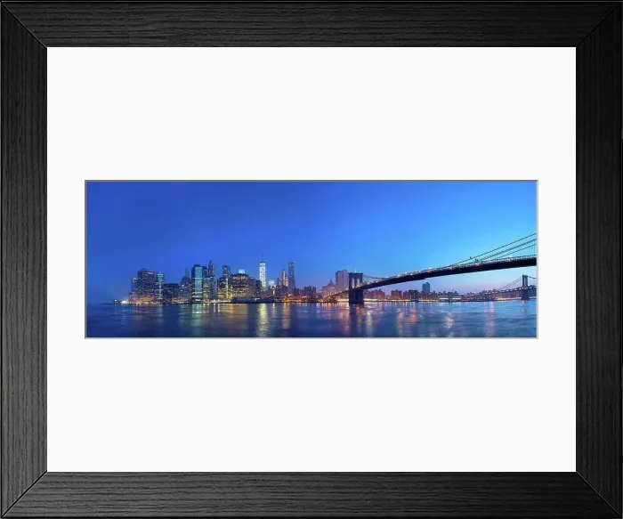 Framed Print : USA, New York City, Manhattan, panorama of financial district with Brooklyn Bridge at dawn