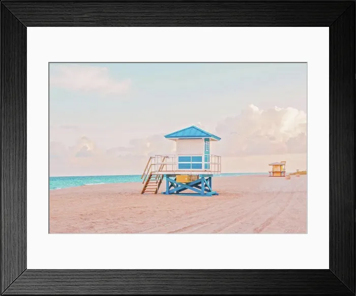 Framed Print : Empty Florida beach with lifeguard houses on sunset. Airy light nature Framed Print : Empty Florida beach with lifeguard houses on sunset. Airy light nature